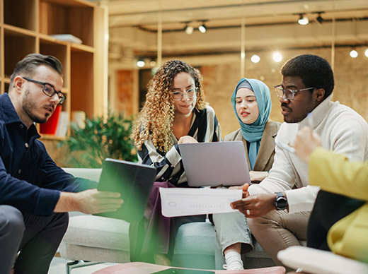 diverse group of coworkers conducting a business meeting
