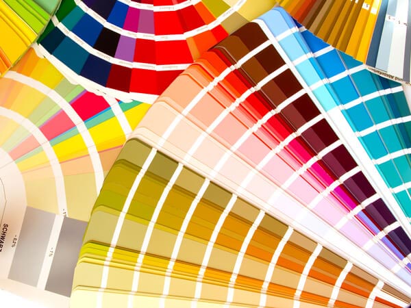 color formula guides laid out on table