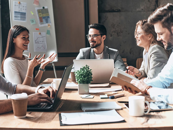 a group of coworkers in a meeting