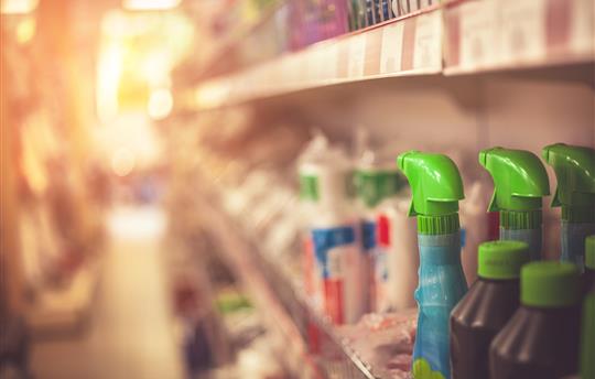 lady looking at monitor with a techical background surrounding her
