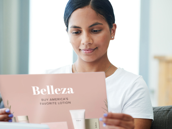 women reading a pre-printed insert