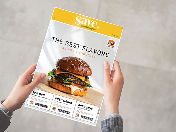 man holding a save wrap flyer