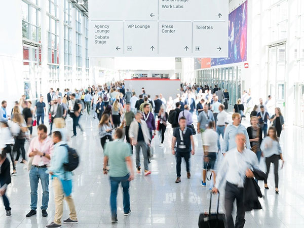 Blurred people at a trade show
