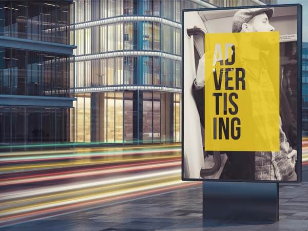 glass buildings in a city and advertisment