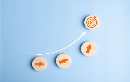 Business growth success achievement concept, hand arranging wooden block