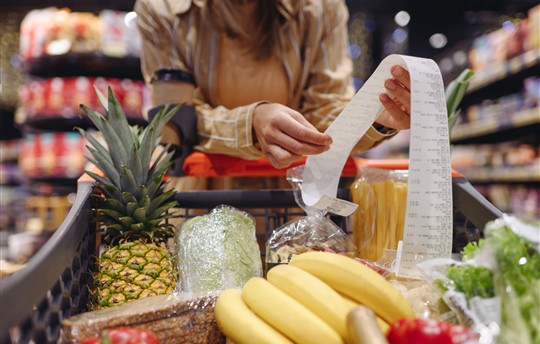 customer woman wear casual clothes read check bill shopping at supermaket store grocery
