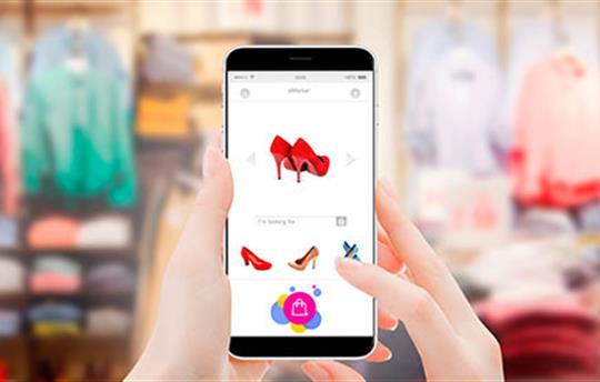 view of an ecommerce website on a mobile phone with the user in the brick-and-mortar store