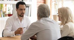 Man consulting elderly couple