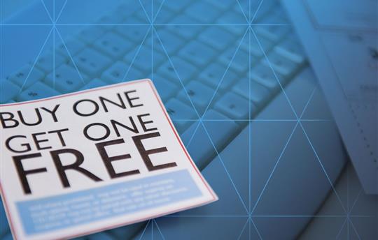 BOGO coupon on a keyboard