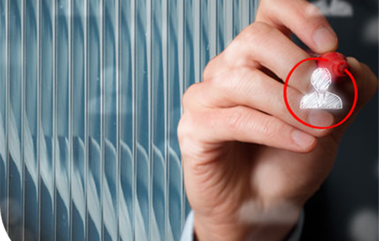 A hand holding a red marker circling an icon that represents a person
